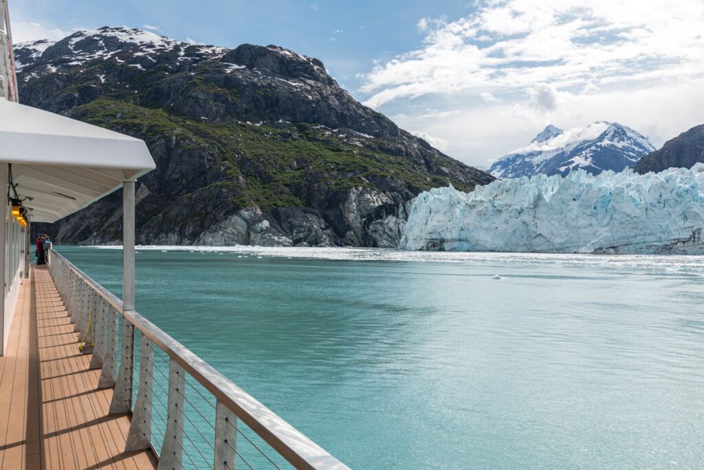 A ship in front of Margerie Glacier, a 21 mi (34 km) long tidewater glacier in Glacier Bay