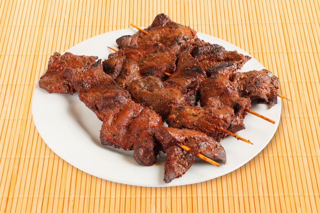 meat skewers on a plate