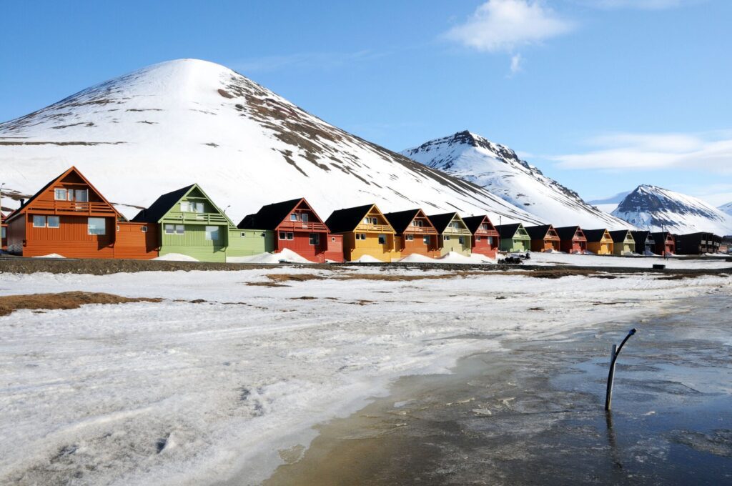 houses in a row in the snow