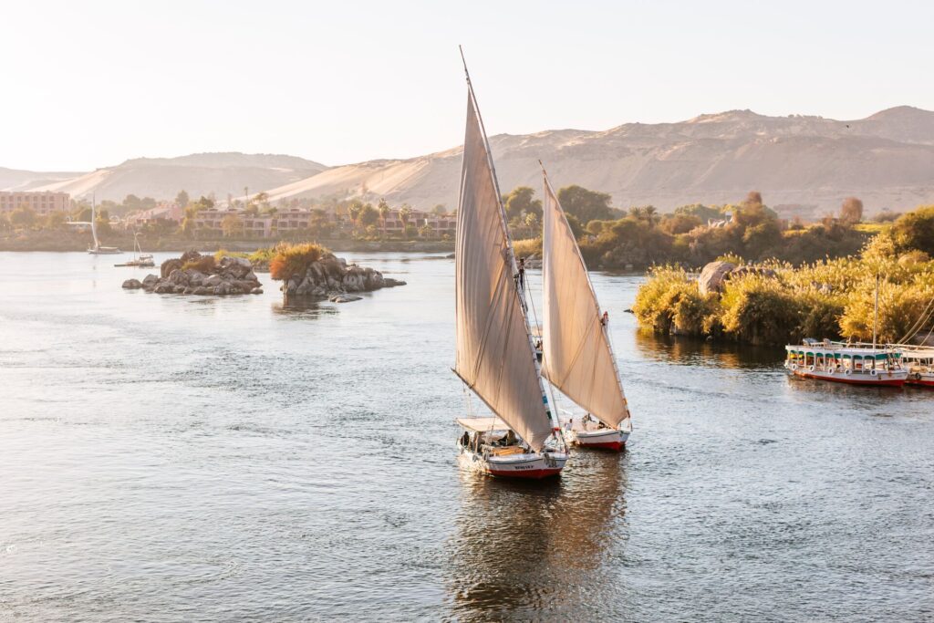 Felucca's and tourist boat on the Nile at Aswan