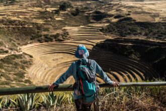 Urubamba Valley - Moray - Tourist looking out