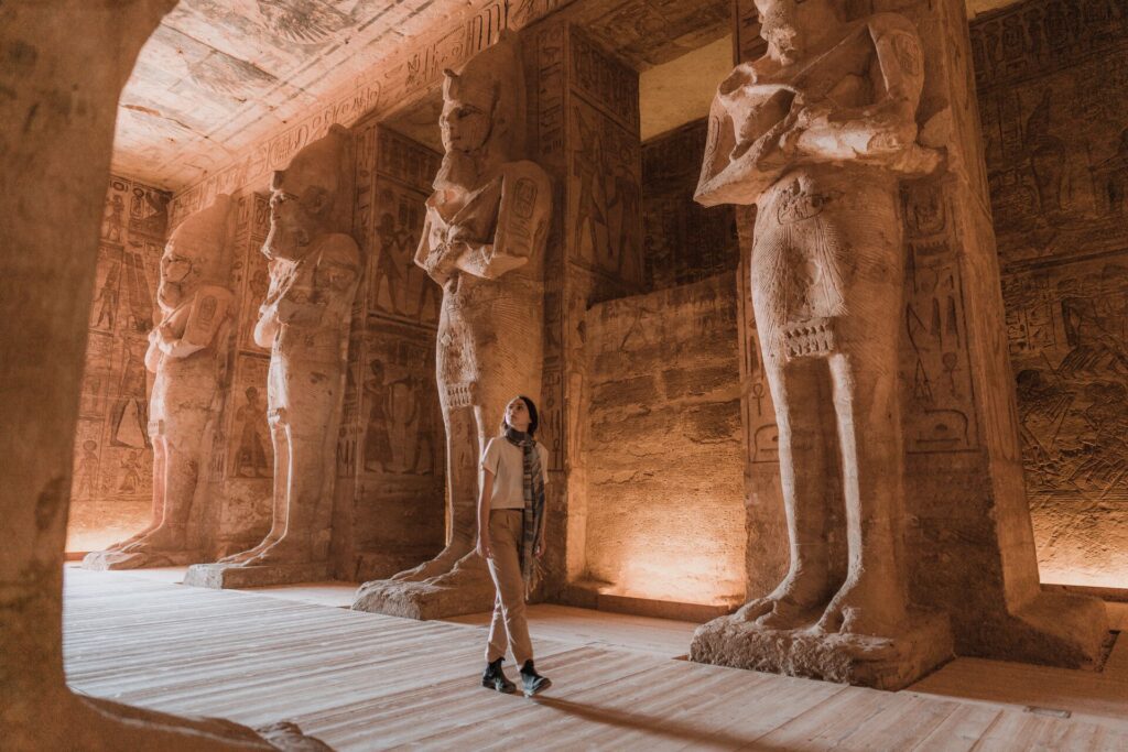 Woman walking inside ancient temples
