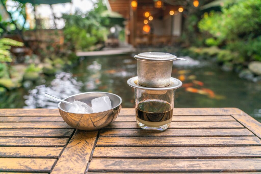 Tradition Vietnam milk coffee with fish tank background