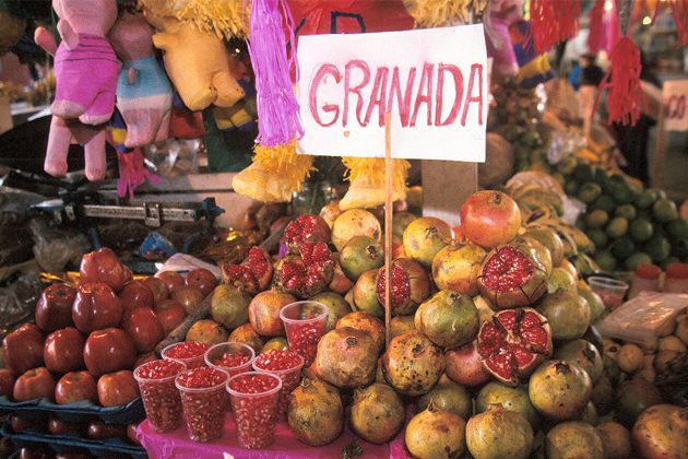 A display of fruits and vegetables for sale at a market