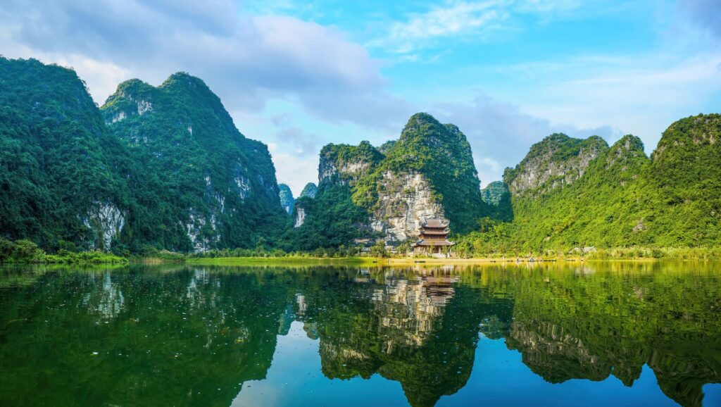 lush landscape in front of a lake