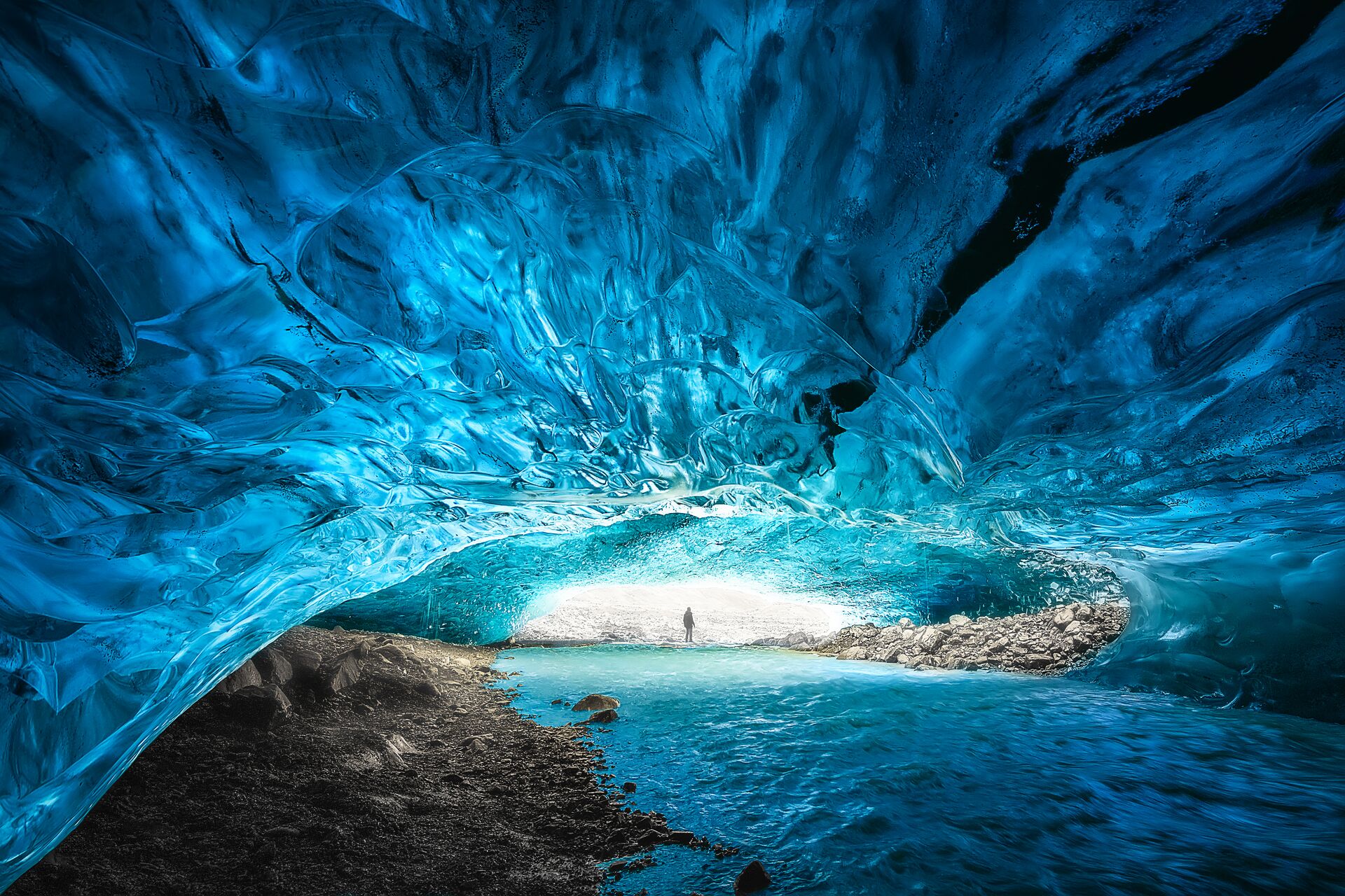 Iceland Vatnajökull National Park Person Shown Deep In Sapphire Blue Ice