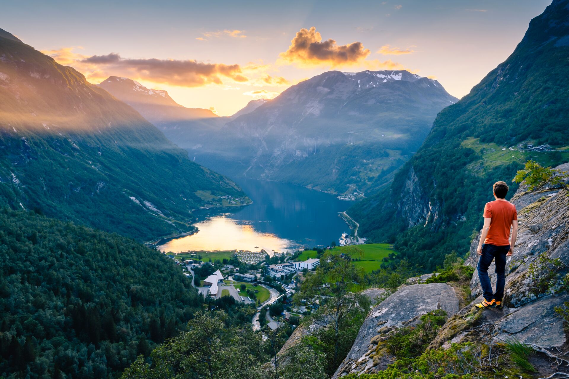 Man Admiring fjord From Viewpoint