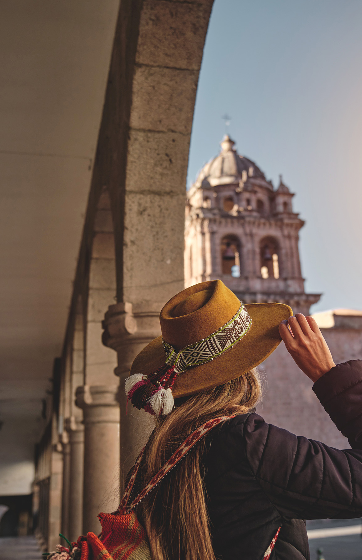 Woman Looking At Buildings in a historic city