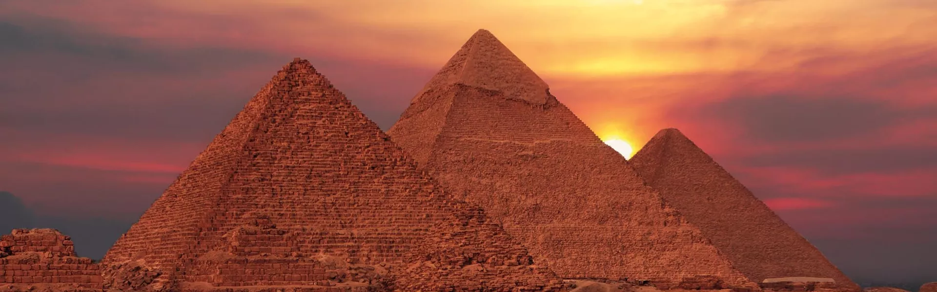 Pyramids of Giza In Egypt by sunset