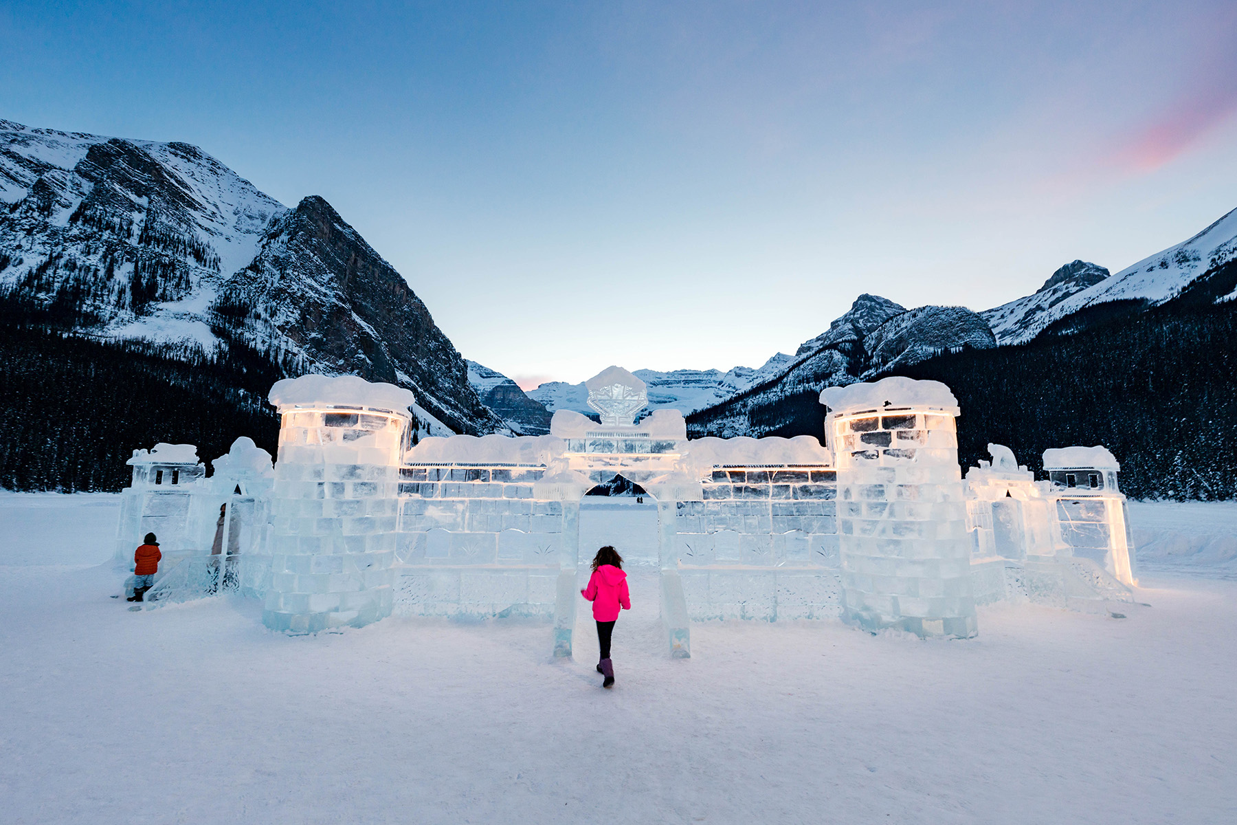 Ice castle sculpture on a frozen lake