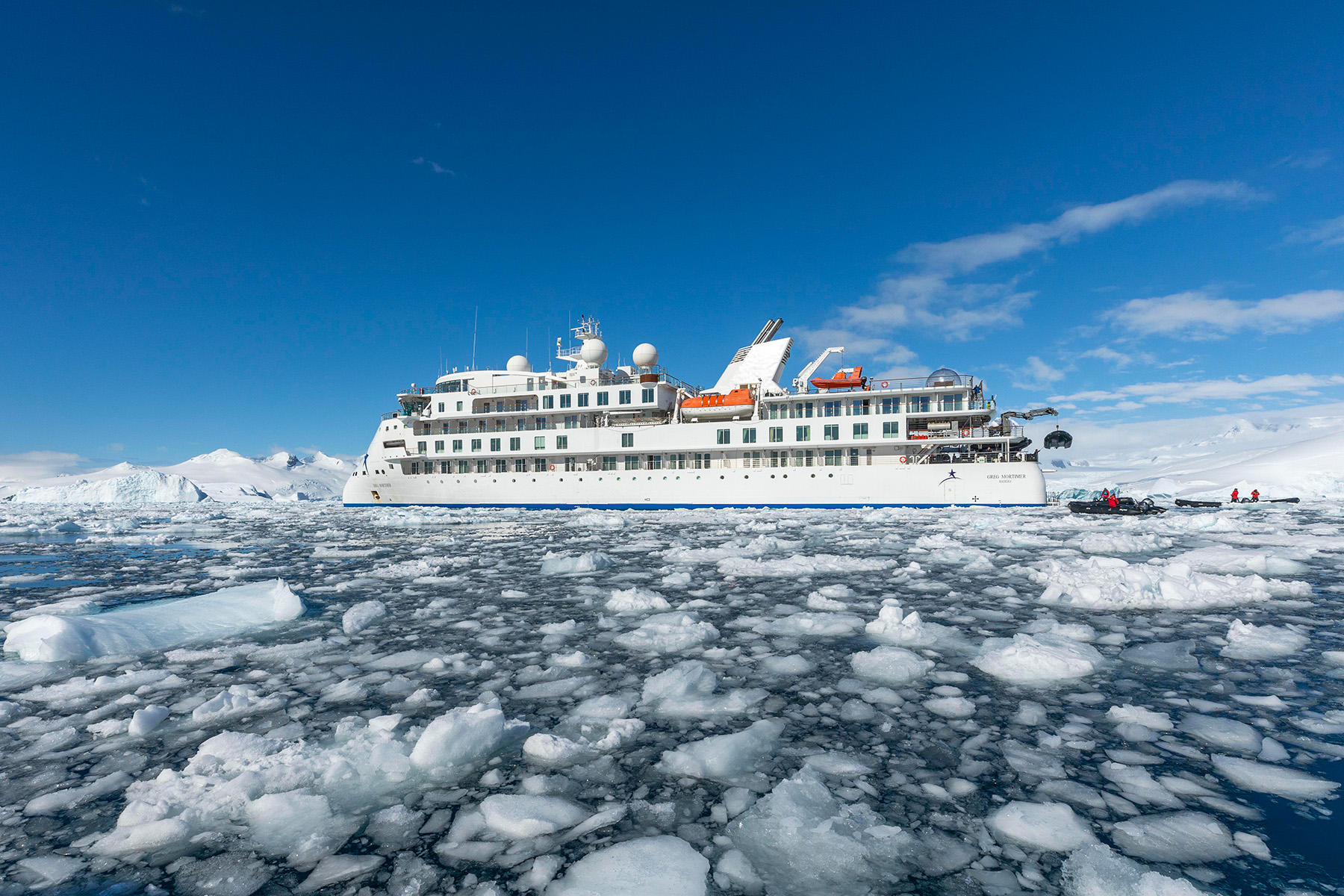 Expedition ship navigating through ice