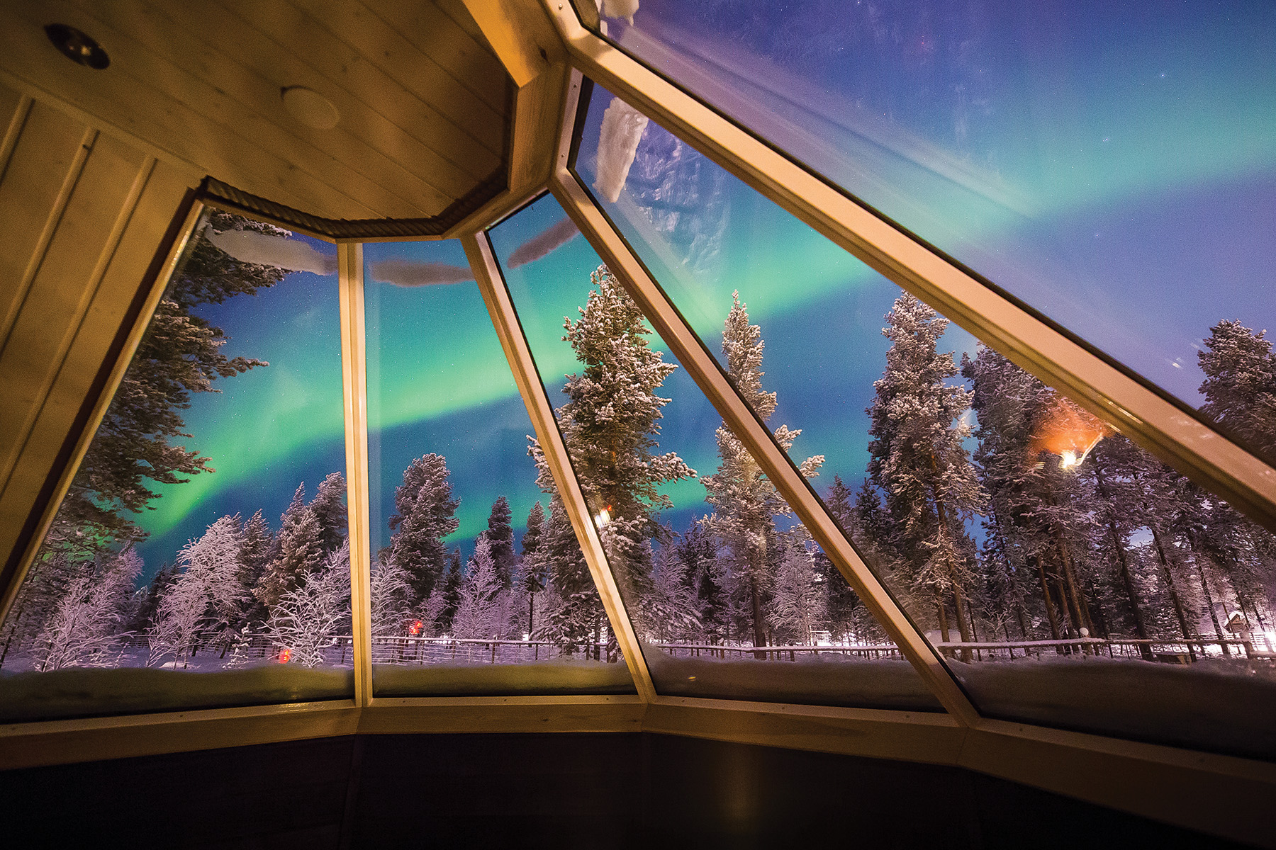Finland Aurora Village Ivalo Glass Window Looking Out To Northern Lights (1)