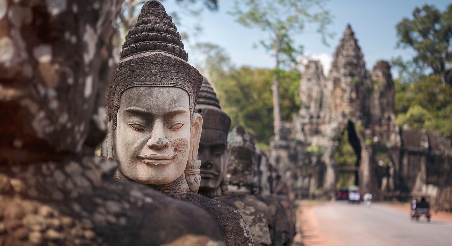 A row of buddha statues in Angkor Wat