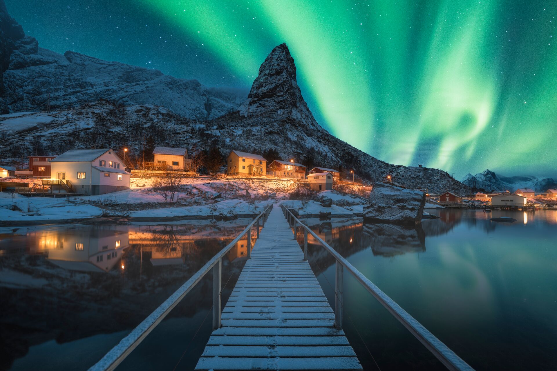 Aurora Borealis over an island with a mountain