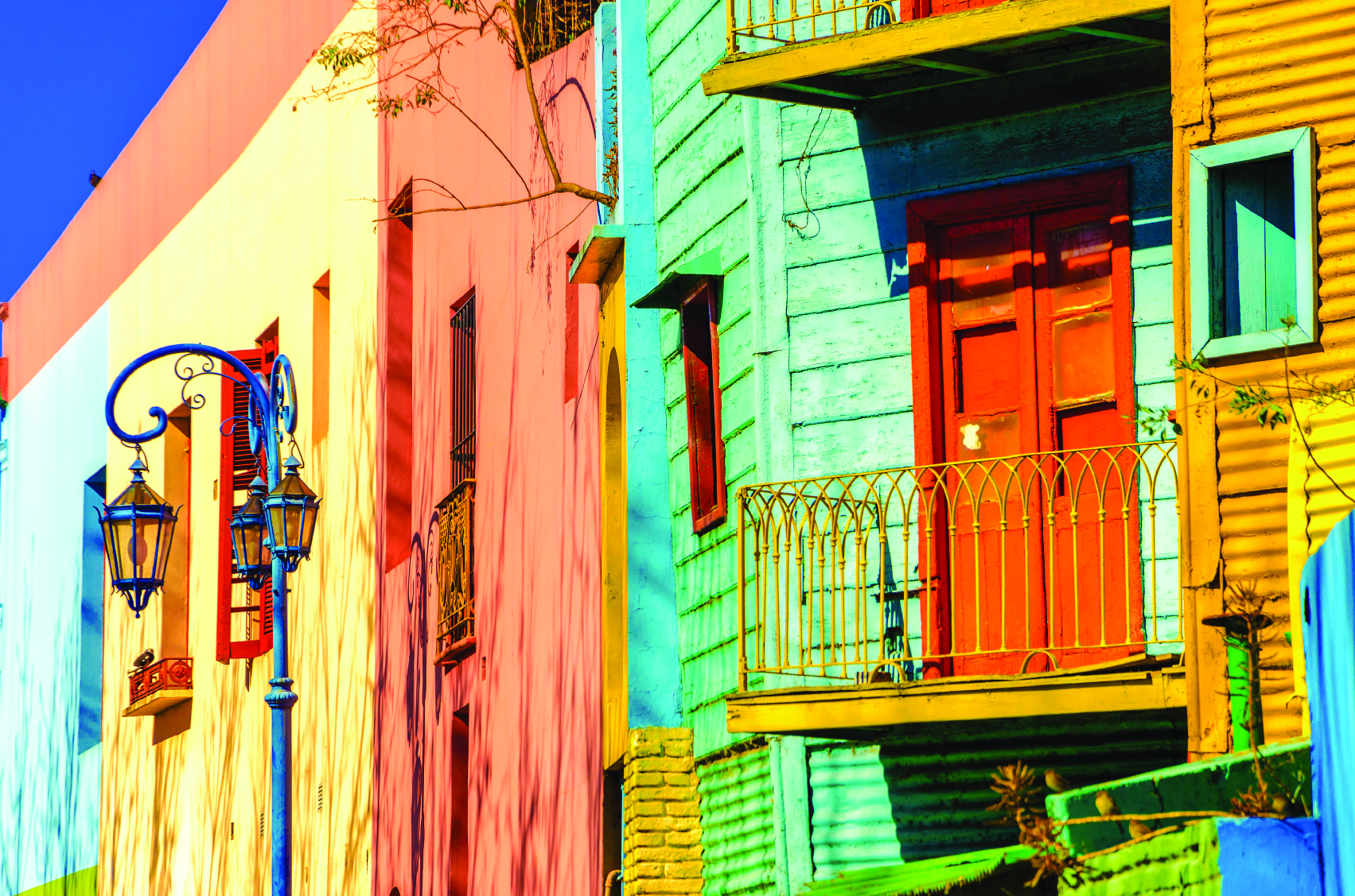 A close up view of a street with colourful houses