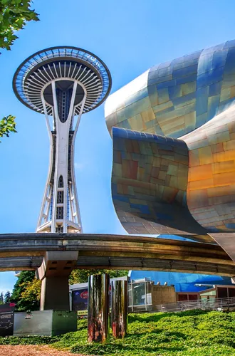 View Of Space Needle, Seattle Center Monorail And Exterior Of The EMP Museum Building