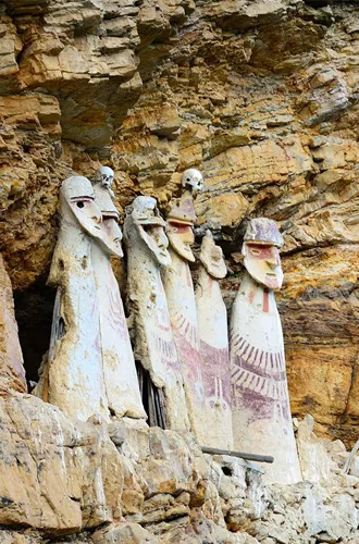 Figures carved into the side of the mountain