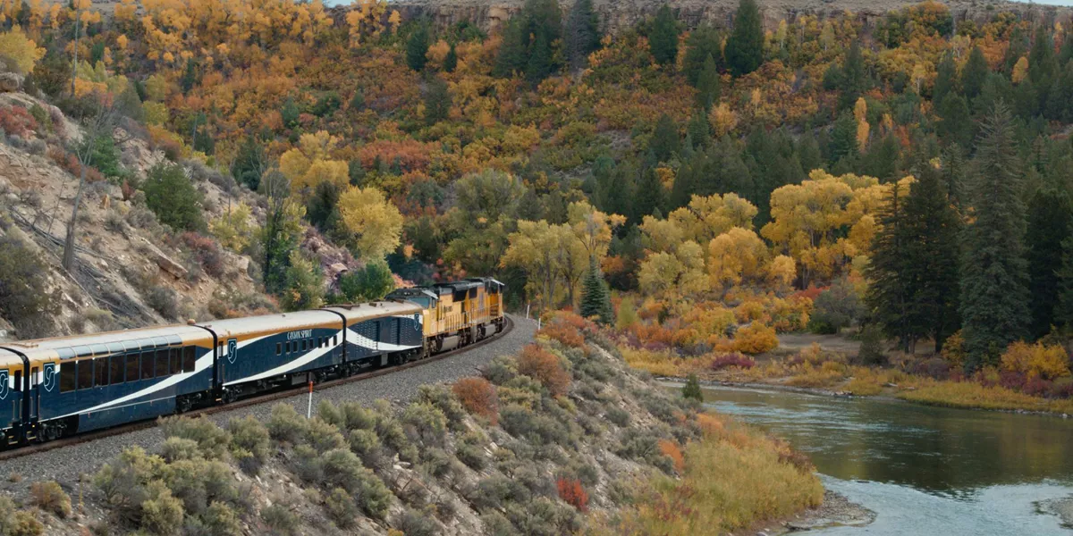 train going through canyon