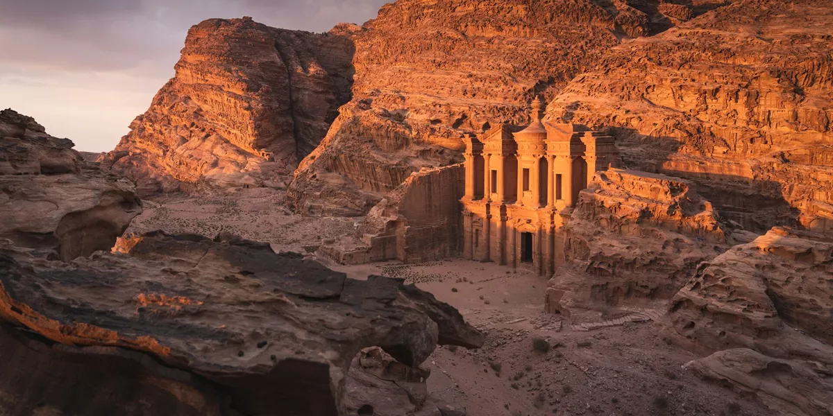The Monastery Or Ad Deir At Beautiful Sunset In Petra Ruin And Ancient City