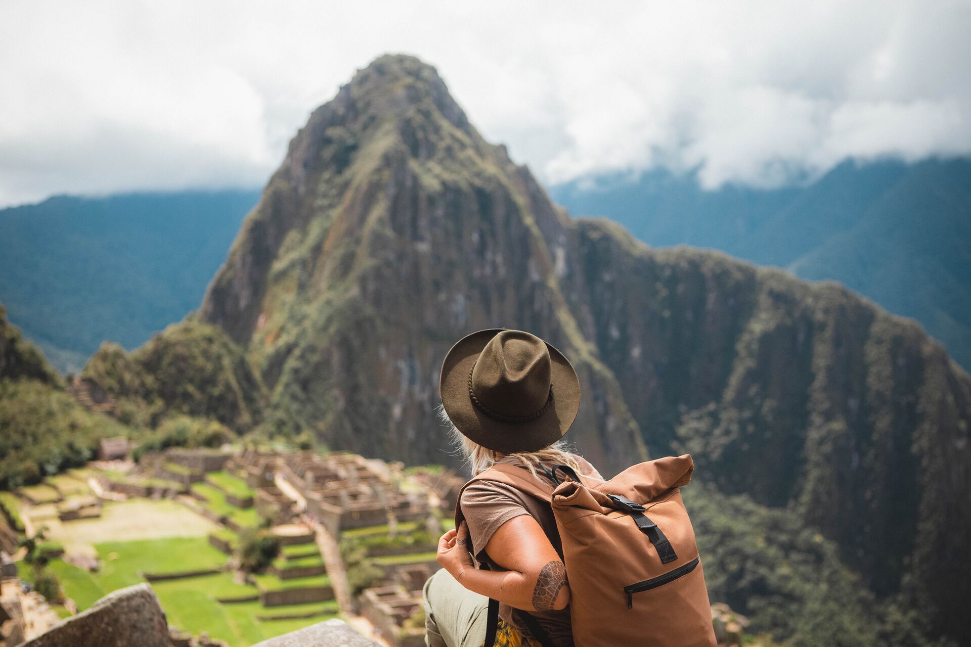 Peru Machu Picchu Rear View Of Woman Looking At Mountains Against Sky