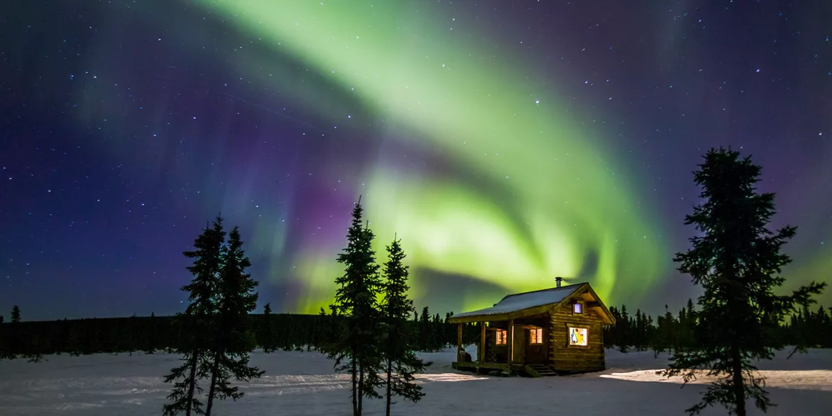 USA Alaska Northern Lights Over Alaska Wilderness Cabin