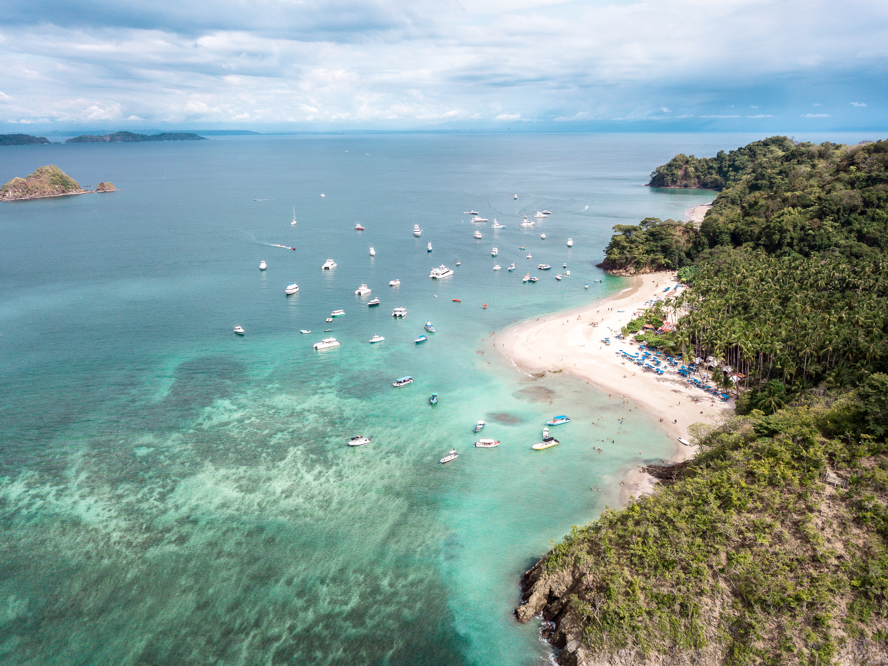 Boats in the sea, on a beach