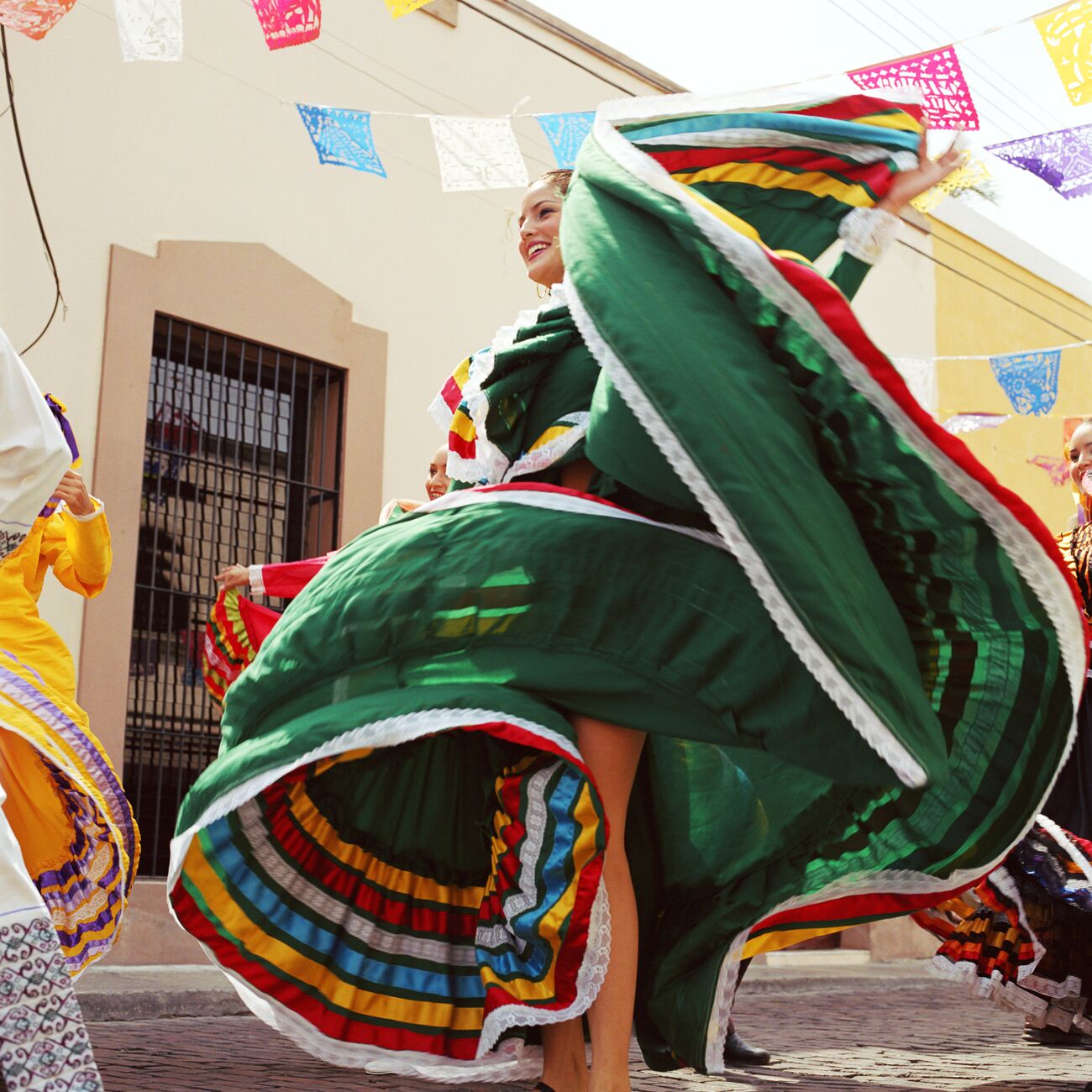 Woman dancing in traditional dress